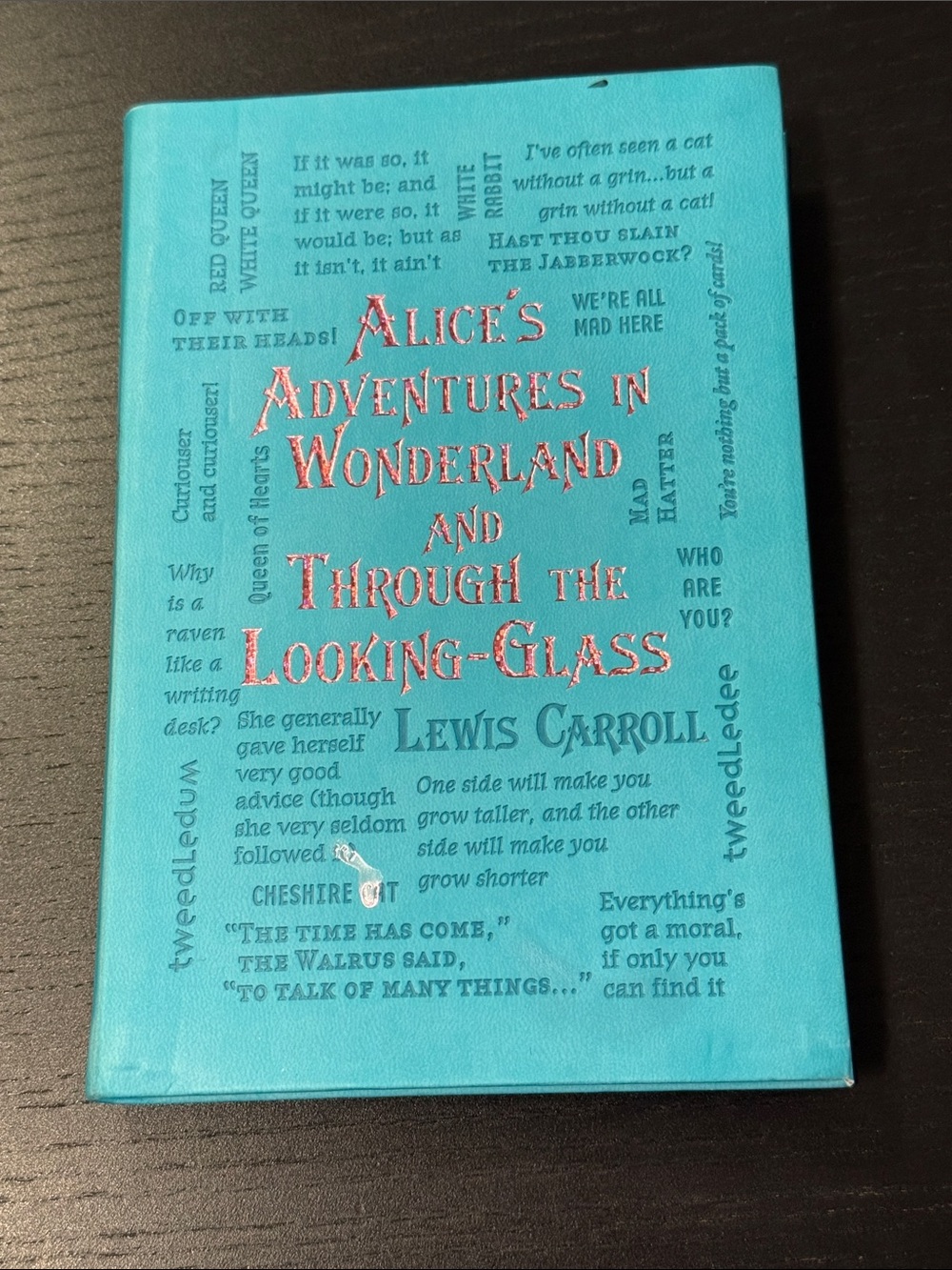 Alice’s adventure in wonderland through the looking glass By Lewis Carroll